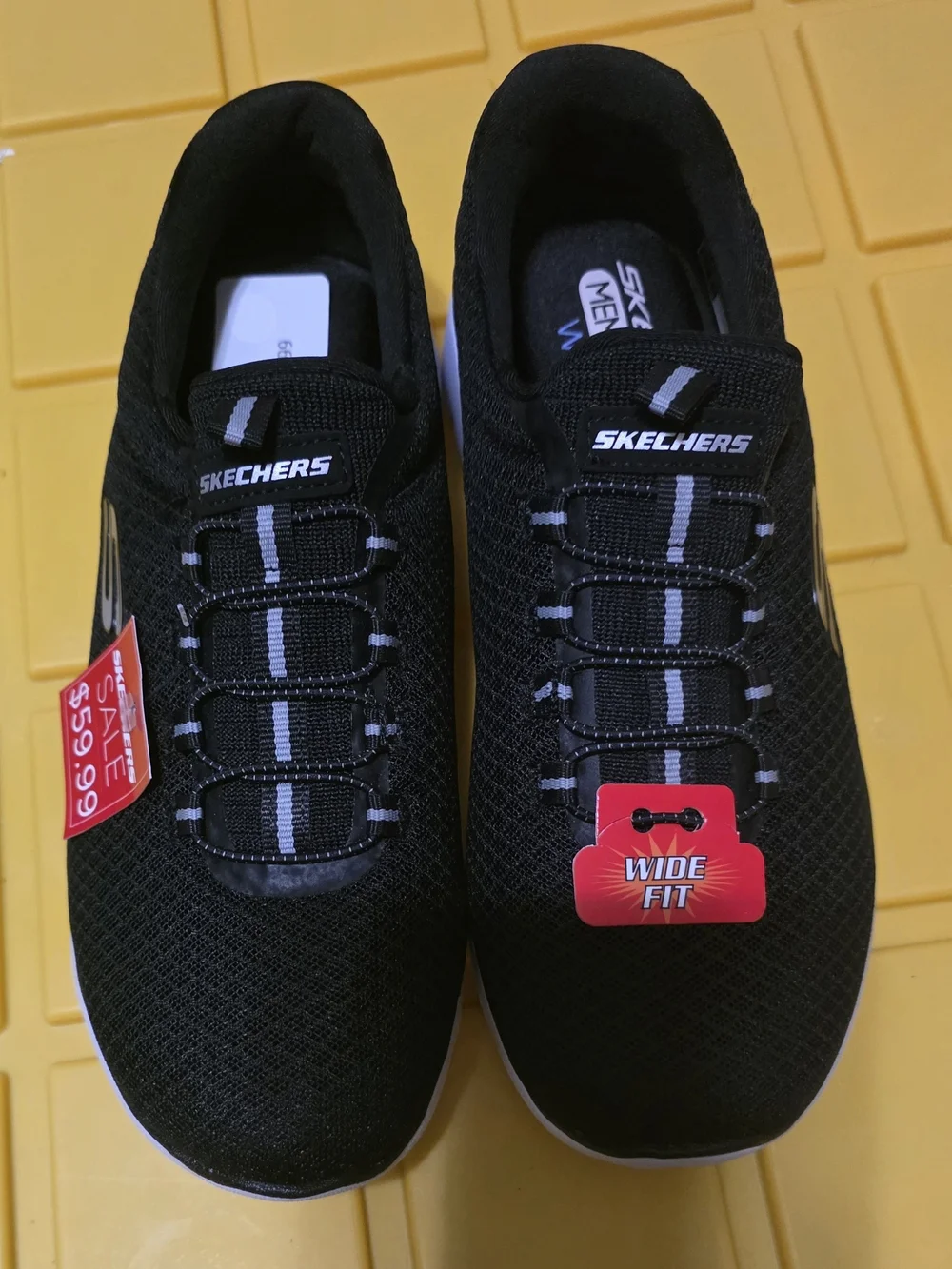 Skechers Black Slip-On Athletic Sneakers with White Soles